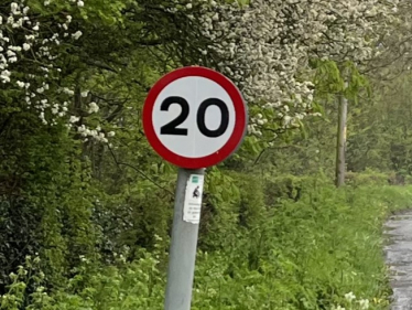 20 miles per hour speed limit sign